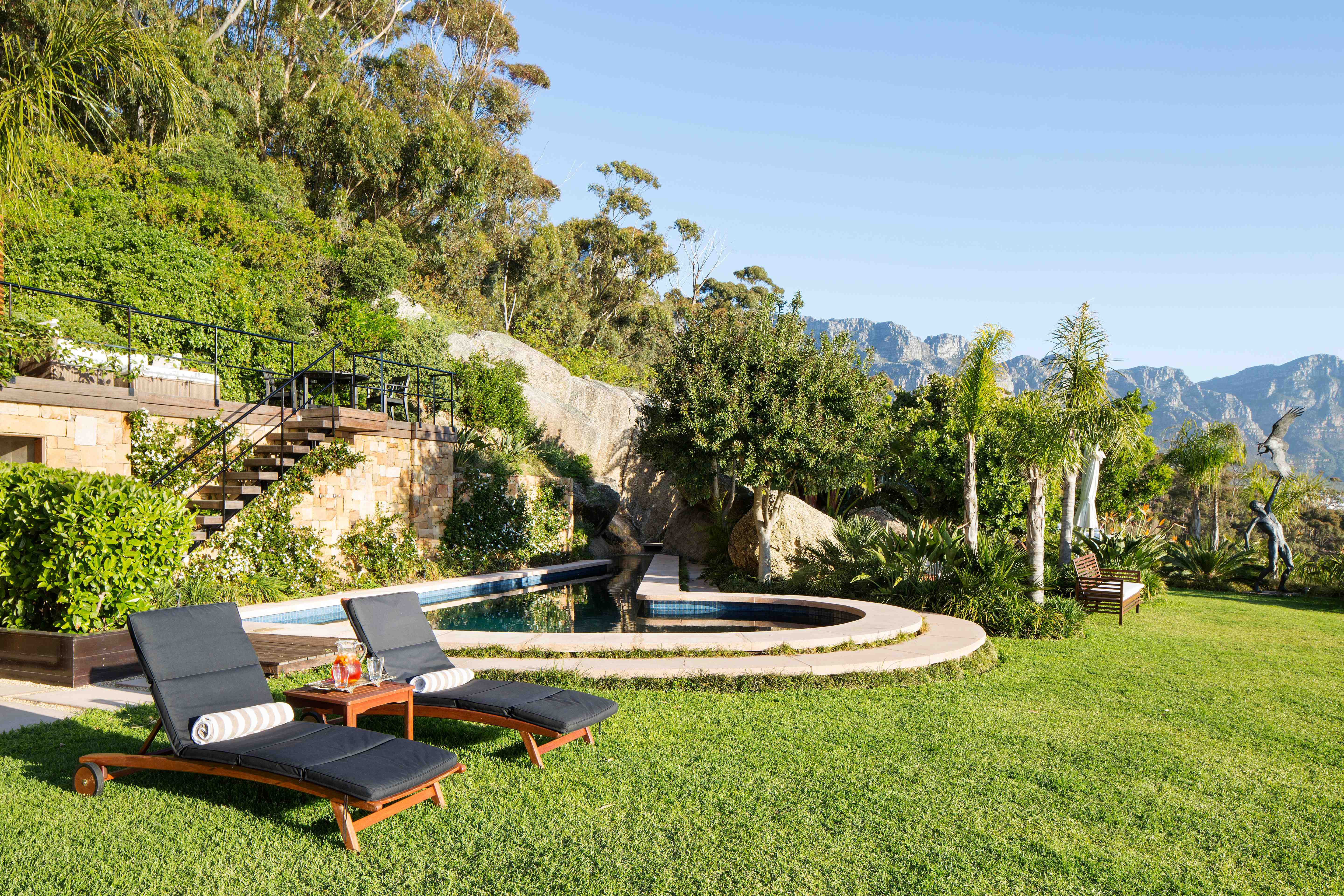 21 Nettleton's outdoor wellness area with spa pool and mountain views