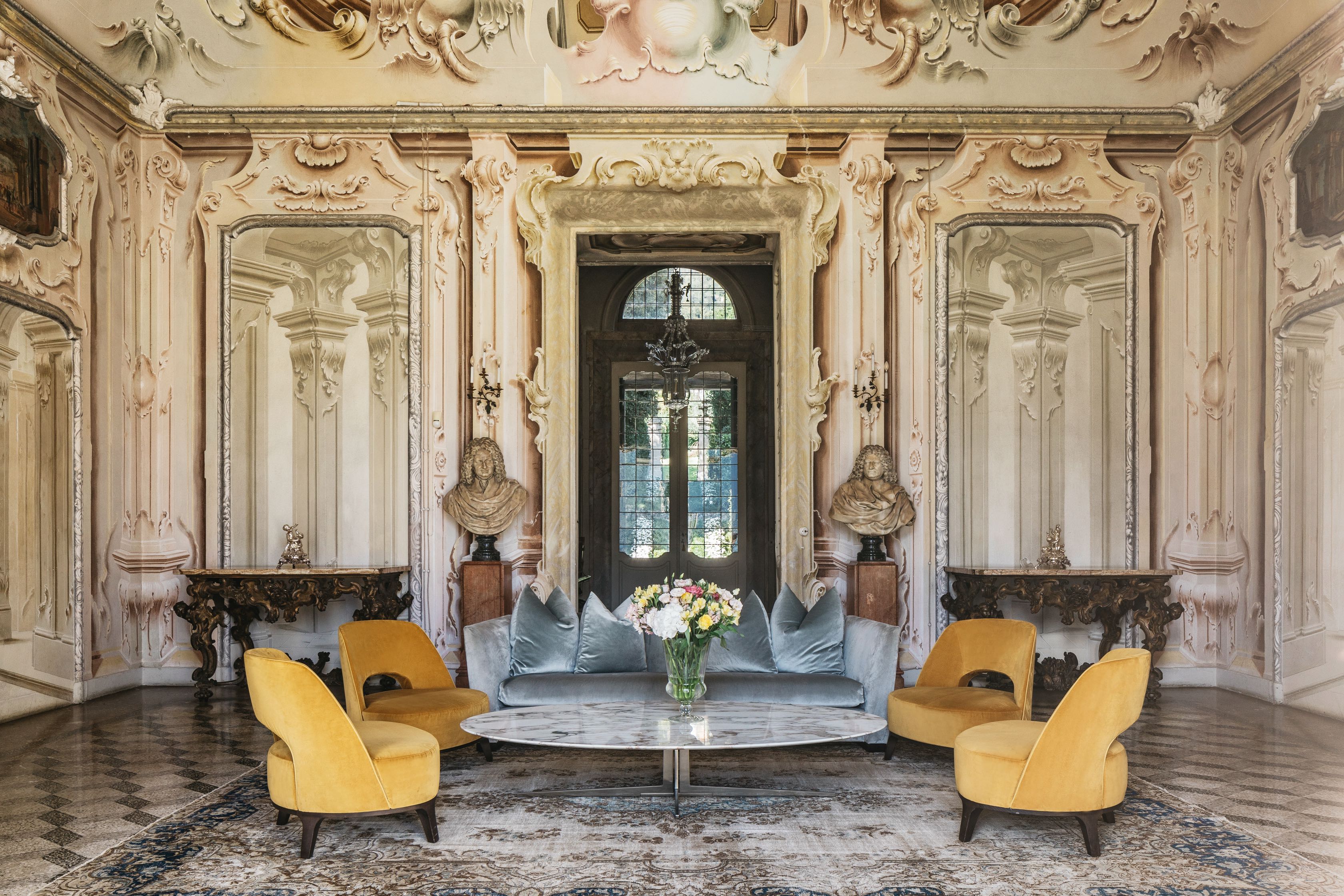 Ornate baroque palazzo entrance with elegant furnishings