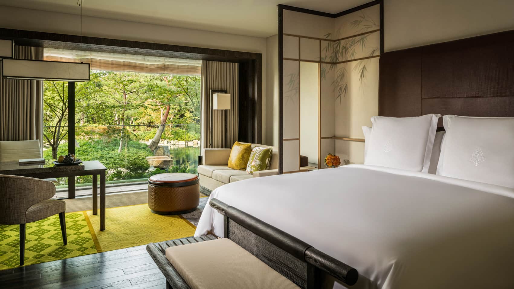 Luxury Four Seasons Hotel Kyoto suite with forest views and modern Japanese-inspired design