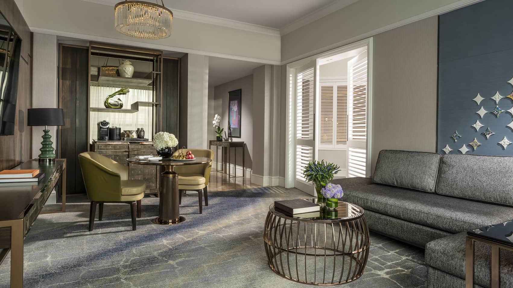 Elegant luxury resort suite with contemporary design, panoramic water views, and sophisticated furnishings